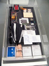 Exhibition View BPL Brower Propulsion Laboratory: Steven Brower, Parker's Box, 2007

BPL-001 Conrad Carpenter Funeral Mission, 2007, waterproof case with objects comprising a nanosatellite, aluminum, nylon, polycarbonate, dacron, mylar, elextronics, latex, steel, brass, paper, urethane, 6