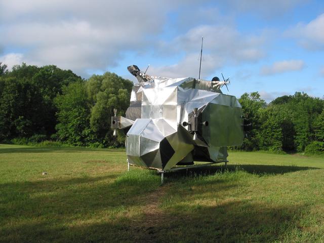 LEM, 2003-2007, 13'X11'X14', aluminum, steel, epoxy, wood, rubber, money
Lunar Excursion Module, left rear 3/4 view at Art Omi, 2004