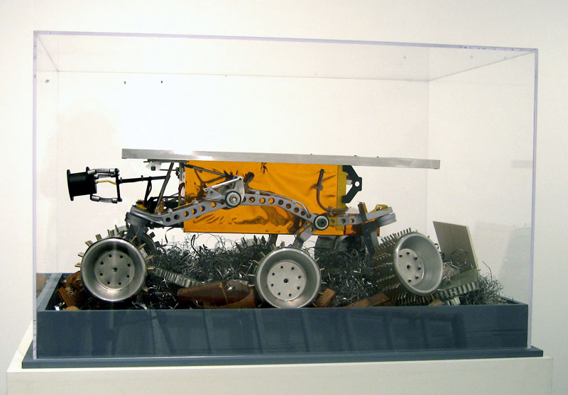 Limited Intelligence Marginally Produced Exploration Rover (LIMPER)
2007, aluminum, urethane, acrylic, mylar, cardboard, paper, Kapton, electronics, 12 3/4 x 31 x 21 inches (32 x 79 x 53 cm)
View of right side.