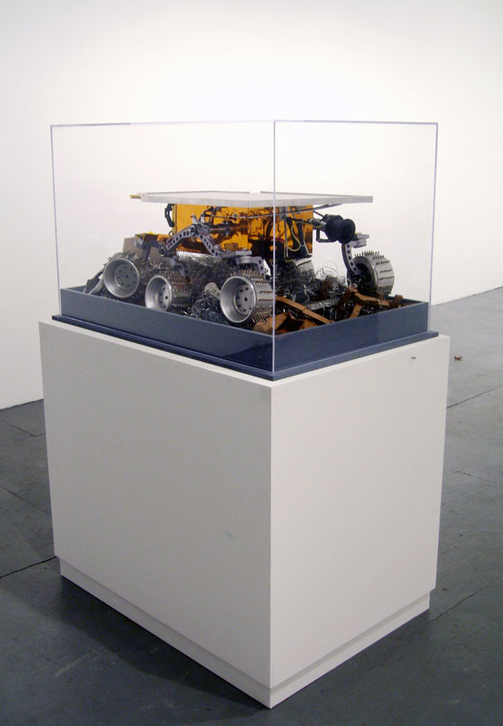 Limited Intelligence Marginally Produced Exploration Rover (LIMPER)
2007, aluminum, urethane, acrylic, mylar, cardboard, paper, Kapton, electronics, 12 3/4 x 31 x 21 inches (32 x 79 x 53 cm)
Full view, rear.
